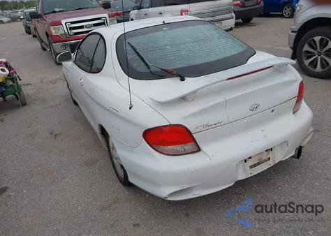 2000 Hyundai Tiburon Base Pkg 1, 2 5/Base Pkg 3 4 z USA, uszkodzony, nr VIN KMHJG35F6YU167638